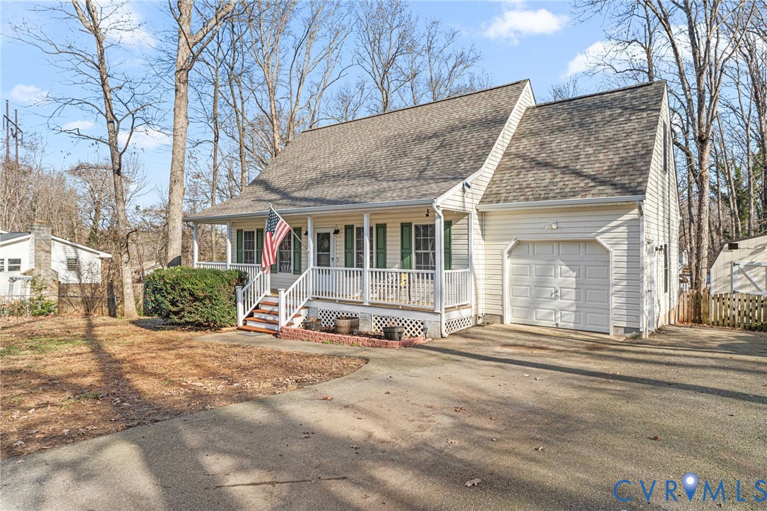 2010 Uleta Road Powhatan, VA 23139 - Photo 2 of 31 a view of a house with a large windows and a large tree
