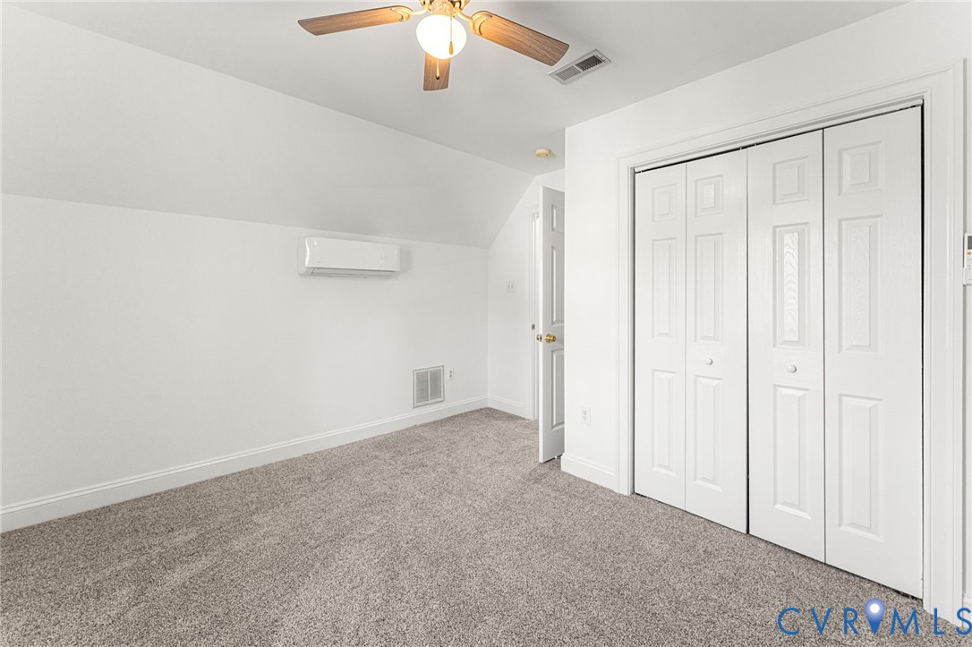 2010 Uleta Road Powhatan, VA 23139 - Photo 24 of 31 an empty room with chandelier fan