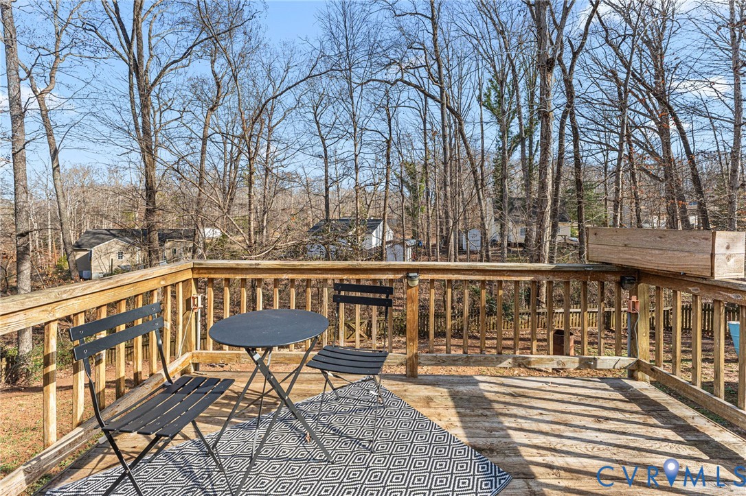 2010 Uleta Road Powhatan, VA 23139 - Photo 25 of 31 a view of a large chairs on deck with wooden floor and fence