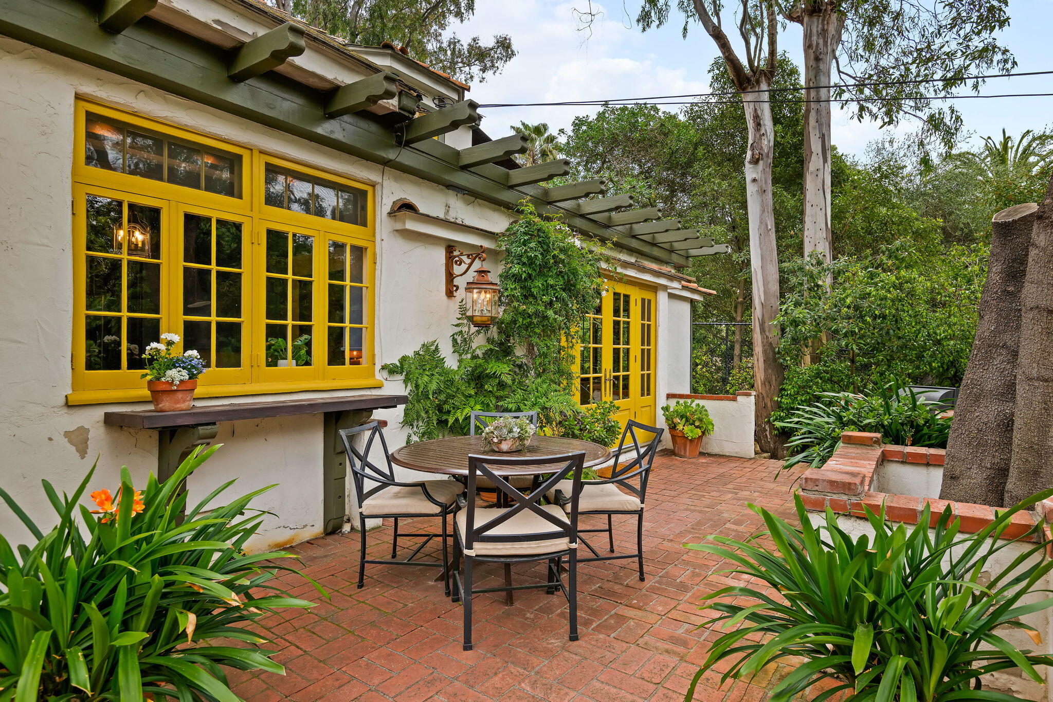2040 Mission Ridge Road Santa Barbara, CA 93103 - Photo 19 of 38 a view of a house with backyard and sitting area