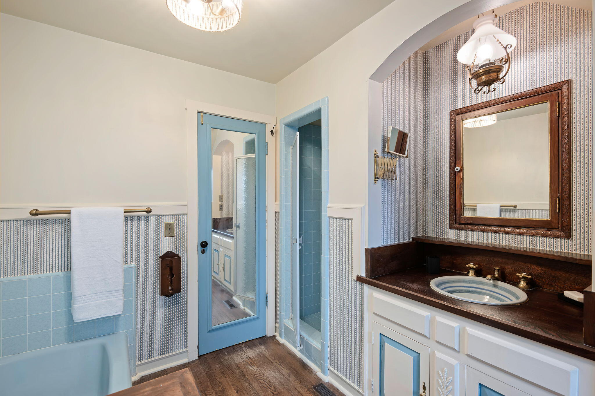2040 Mission Ridge Road Santa Barbara, CA 93103 - Photo 30 of 38 a bathroom with a granite countertop sink and a mirror