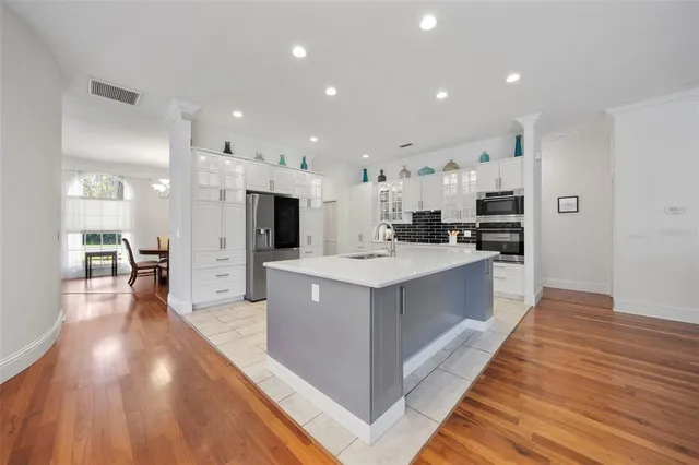 a white bath tub sitting next to a window