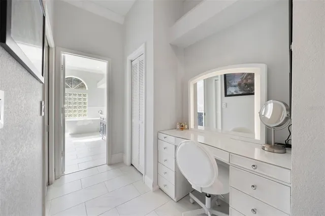 a bathroom with a double vanity sink toilet mirror and shower