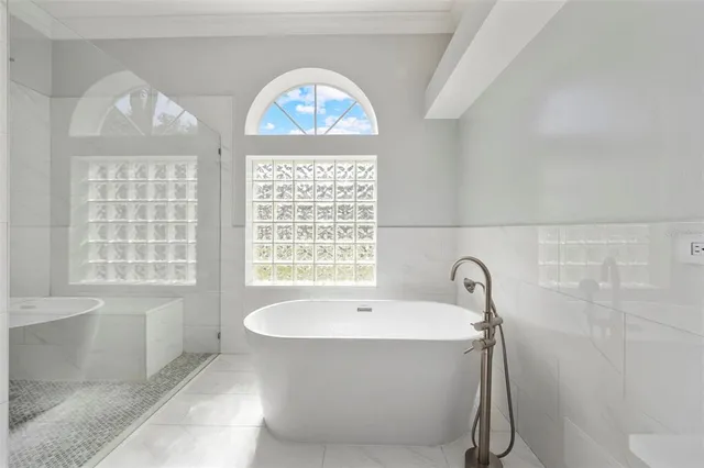 a view of a swimming pool with a porch