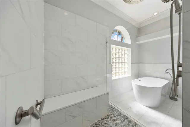 a view of a patio with a table and chairs