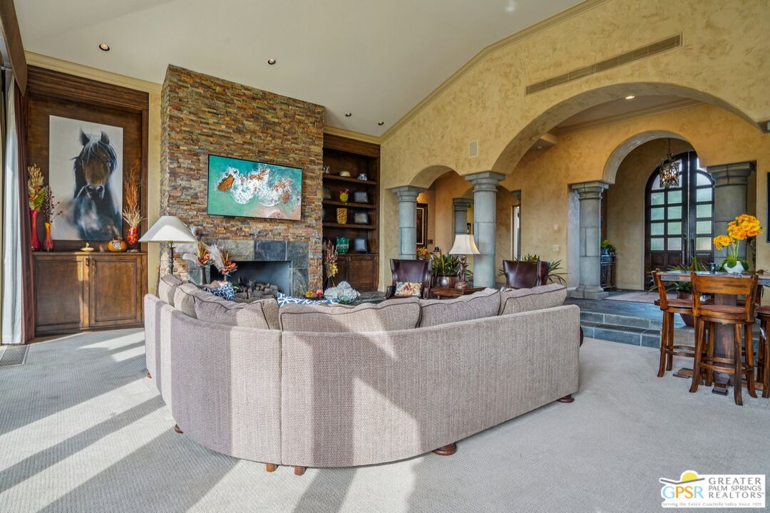 20 Clancy Lane Estates Rancho Mirage, CA 92270 - Photo 11 of 75 a living room with fireplace furniture and a flat screen tv