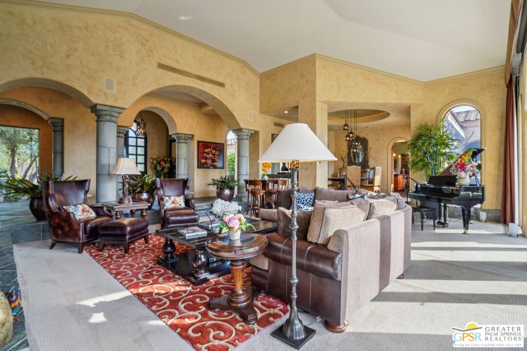 20 Clancy Lane Estates Rancho Mirage, CA 92270 - Photo 12 of 75 a living room with fireplace furniture and a chandelier