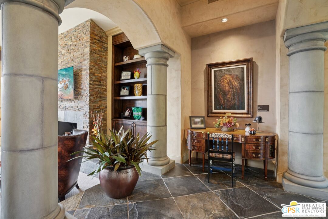 20 Clancy Lane Estates Rancho Mirage, CA 92270 - Photo 15 of 75 a vase of flowers sitting on a table in front of a door