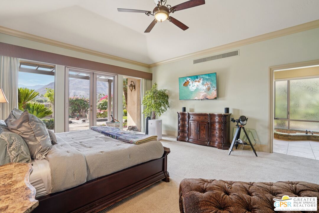 20 Clancy Lane Estates Rancho Mirage, CA 92270 - Photo 49 of 75 a bedroom with furniture and a large window