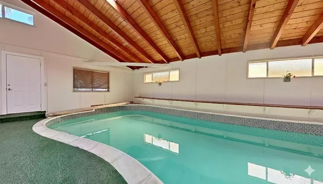 a view of a indoor swimming pool
