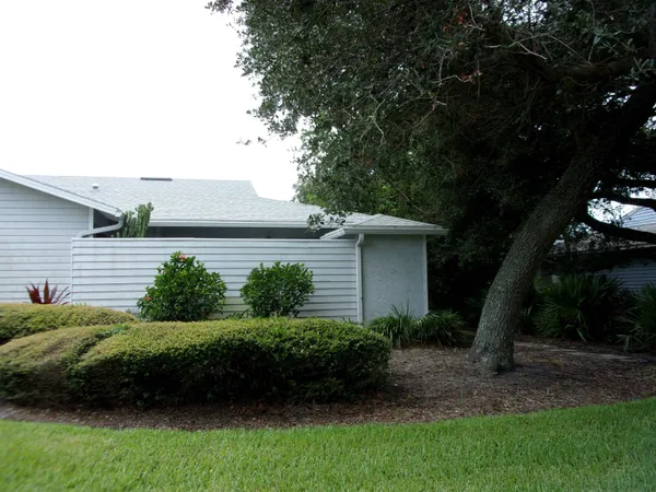 a view of a back yard of the house