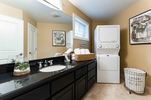 a bathroom with a sink double vanity and a mirror