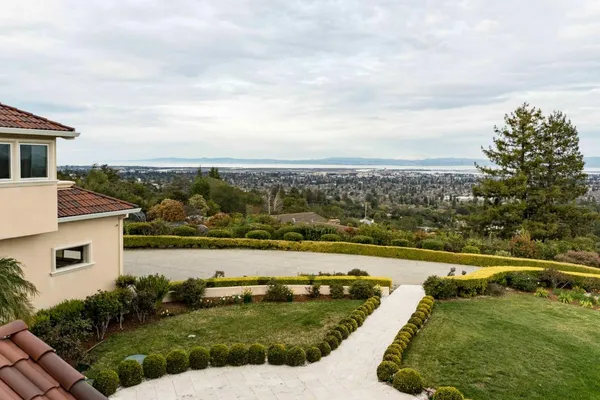 a view of a city with lawn chairs
