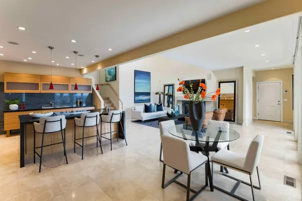 a view of a living room and dining room