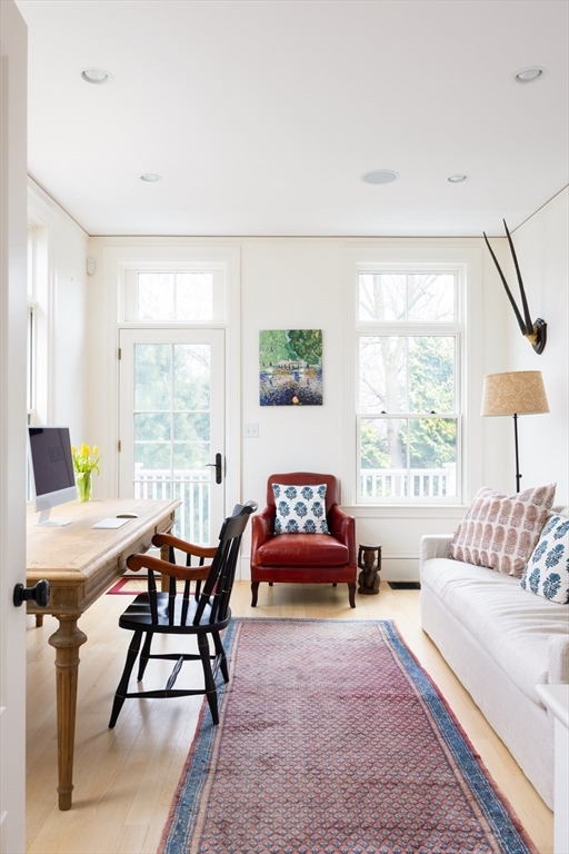371 Walnut Street Brookline, MA 02445 - Photo 14 of 40 a living room with furniture and a large window