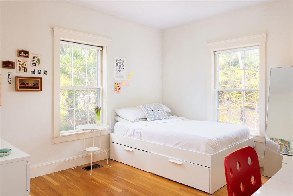 371 Walnut Street Brookline, MA 02445 - Photo 35 of 40 a bedroom with a bed and a window