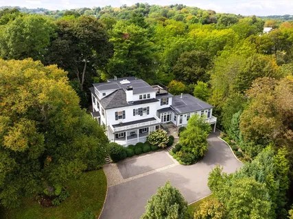 an aerial view of a house with a garden
