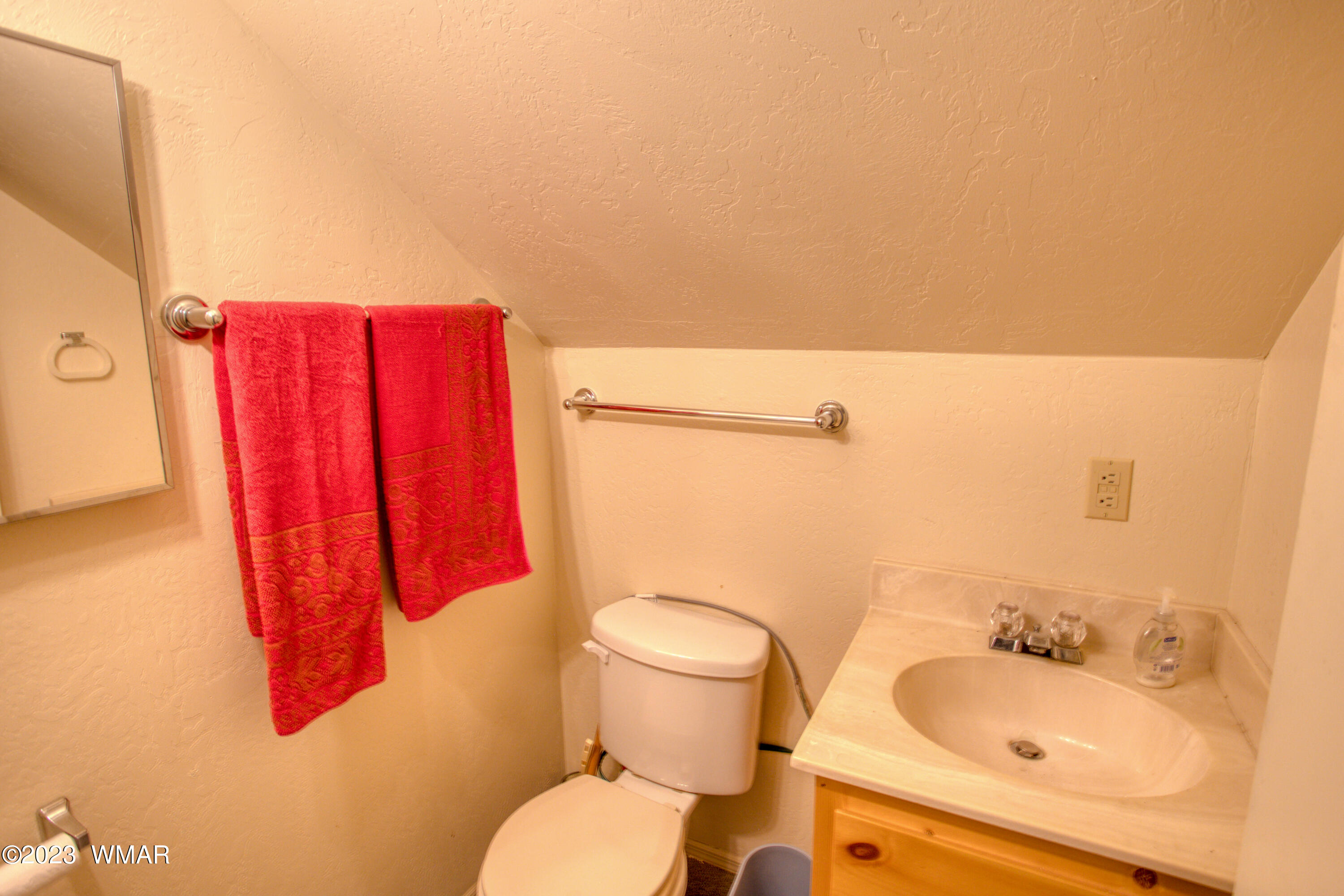 3288 Lake View Drive Pinetop, AZ 85935 - Photo 25 of 32 a bathroom with a sink and a toilet