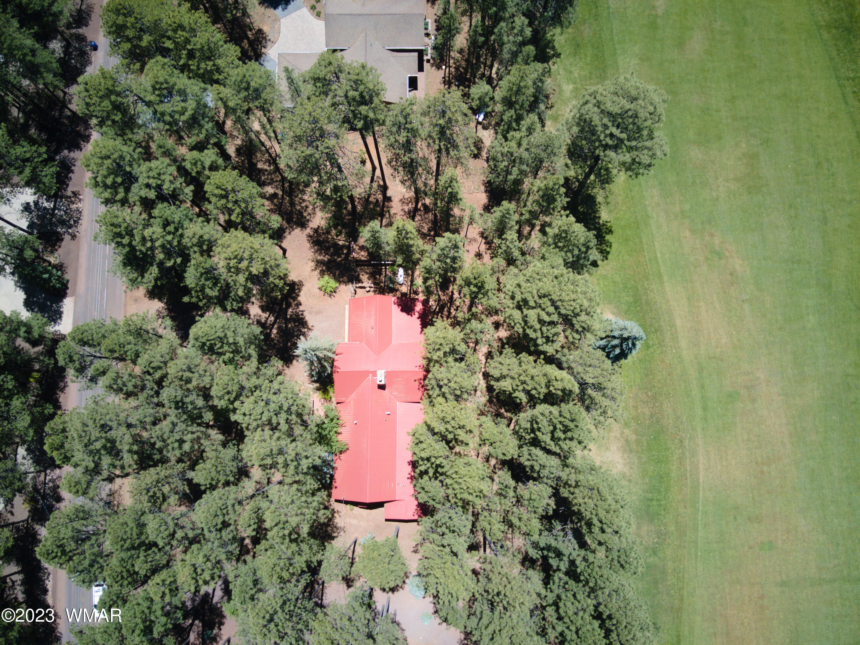 3288 Lake View Drive Pinetop, AZ 85935 - Photo 31 of 32 an aerial view of a house with a yard