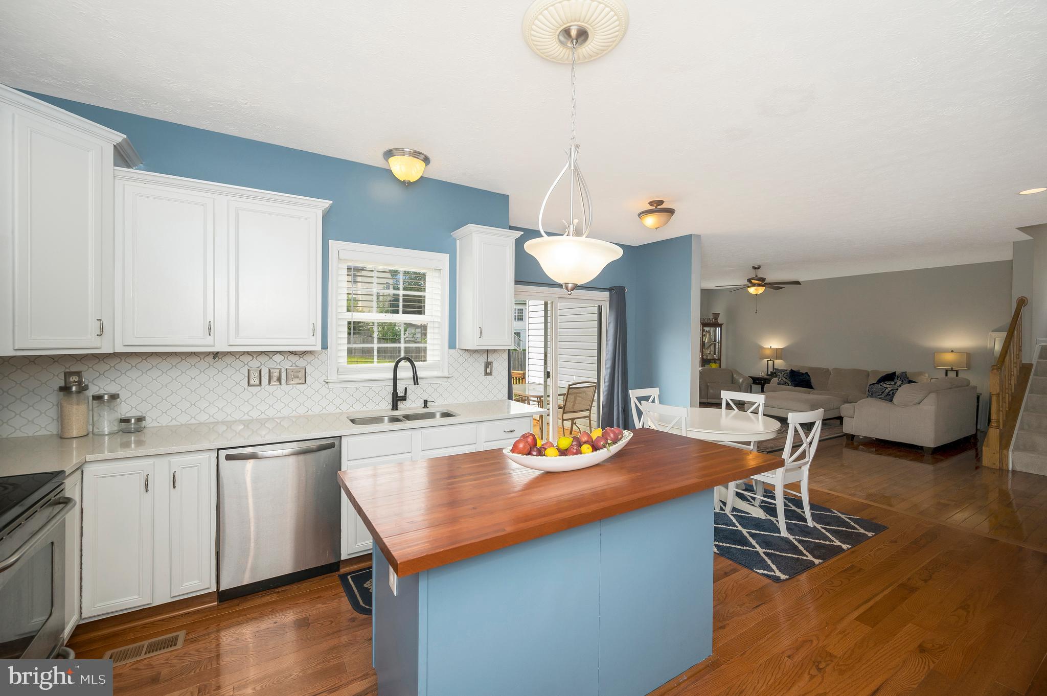 35342 Hawks Nest Court Locust Grove, VA 22508 - Photo 19 of 52 a kitchen with a sink a counter space appliances and cabinets