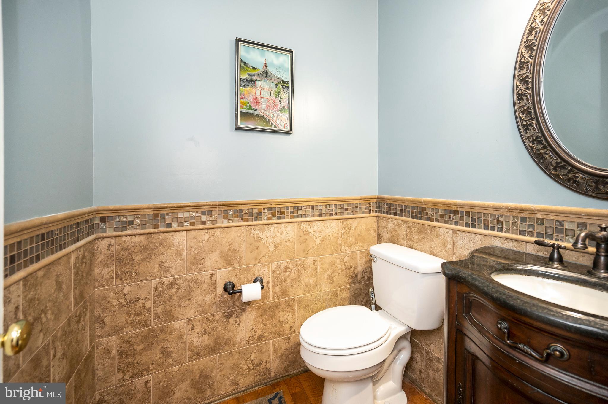 35342 Hawks Nest Court Locust Grove, VA 22508 - Photo 7 of 52 a bathroom with a sink mirror vanity and toilet