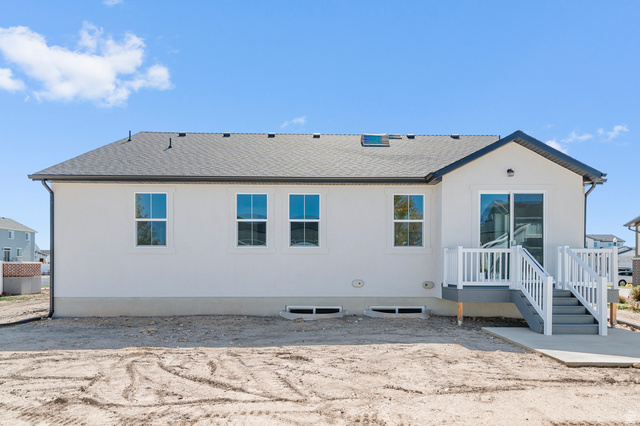 3016 West 2650 North Clinton, UT 84015 - Photo 5 of 20 Back of house featuring roof with shingles and a patio
