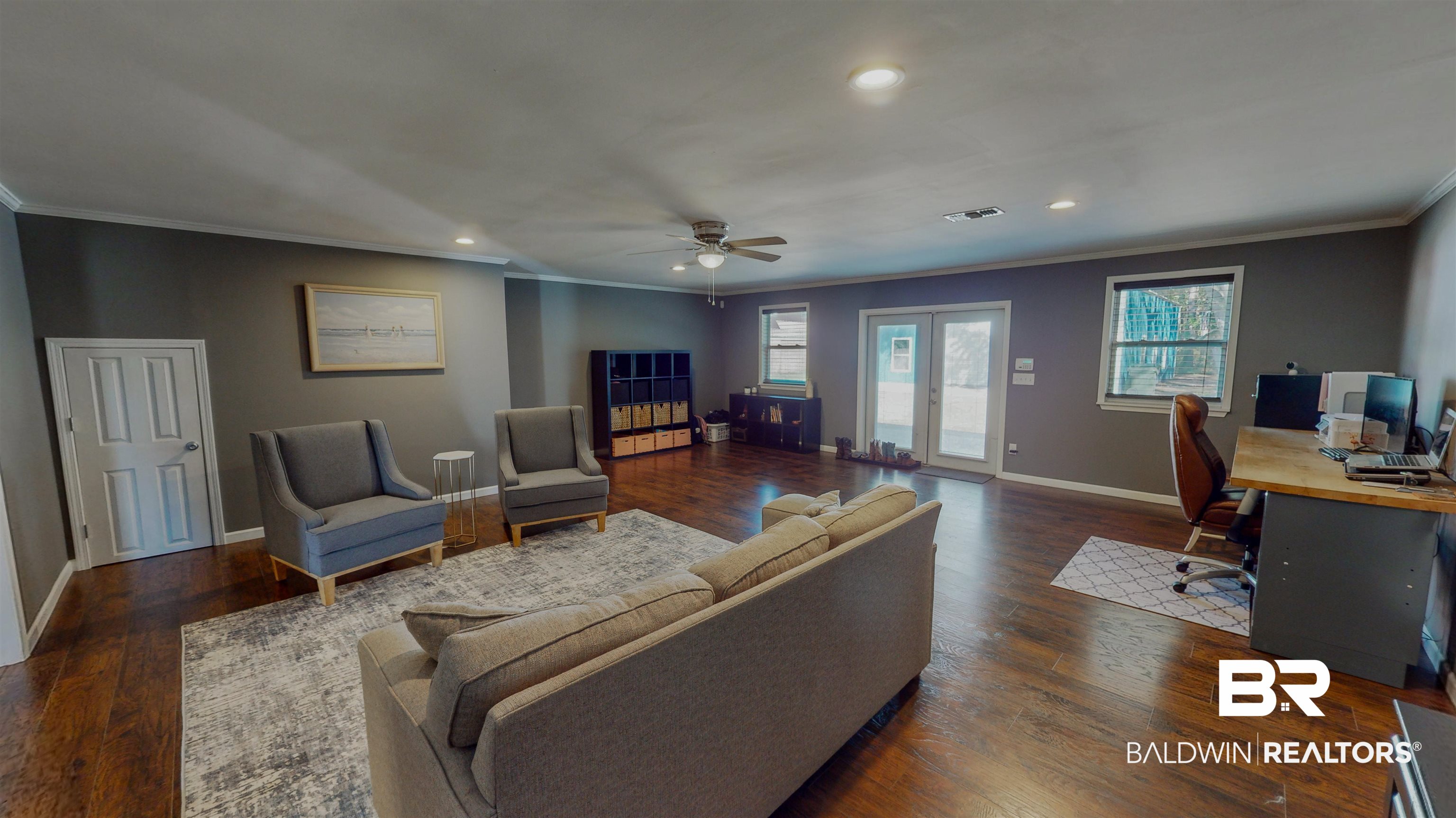 19365 Keller Road Foley, AL 36535 - Photo 11 of 41 Living room featuring ceiling fan, french doors, dark wood-type flooring, and crown molding