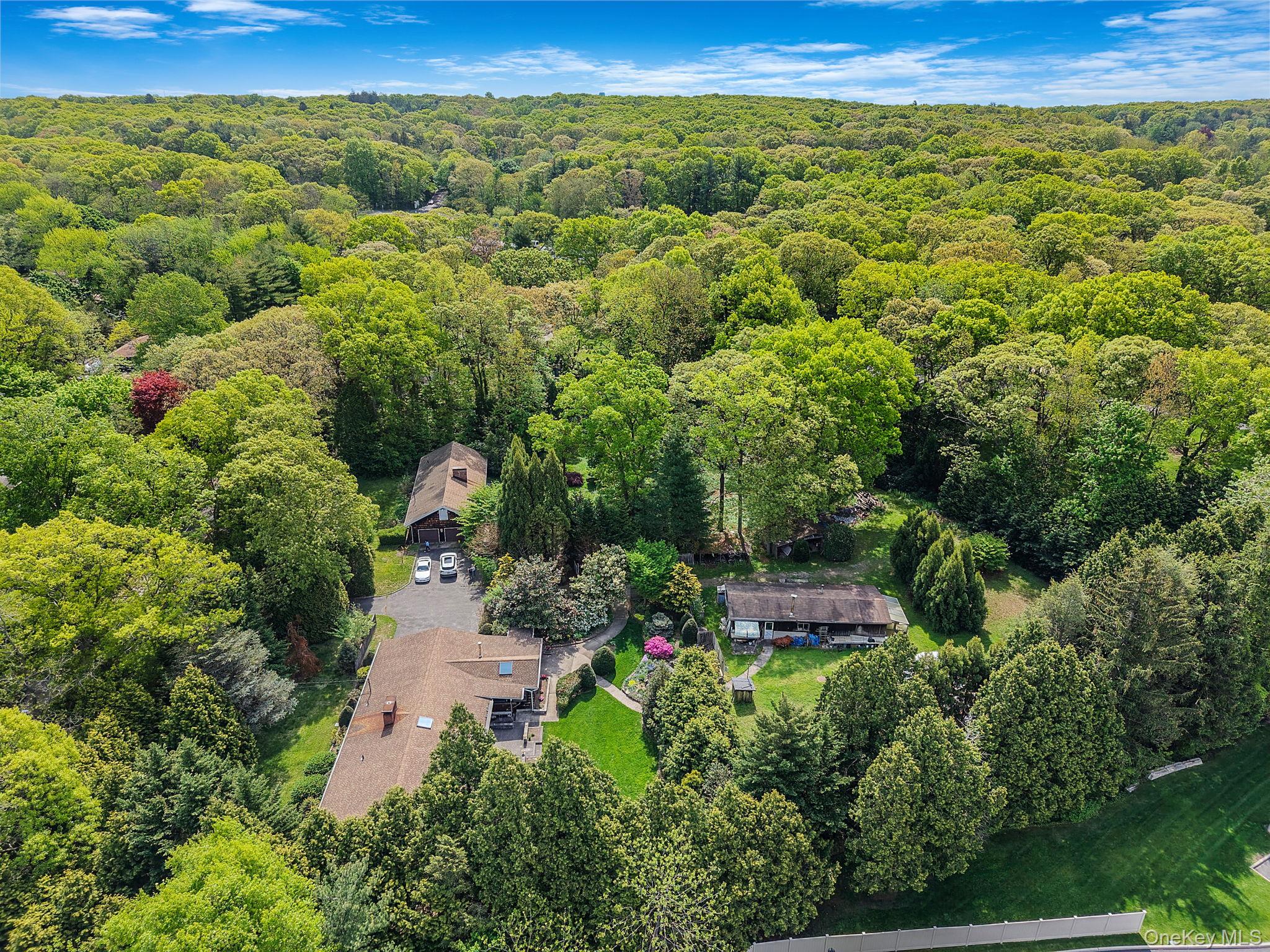280 Deforest Road North Dix Hills, NY 11746 - Photo 6 of 37 an aerial view of a house with a yard
