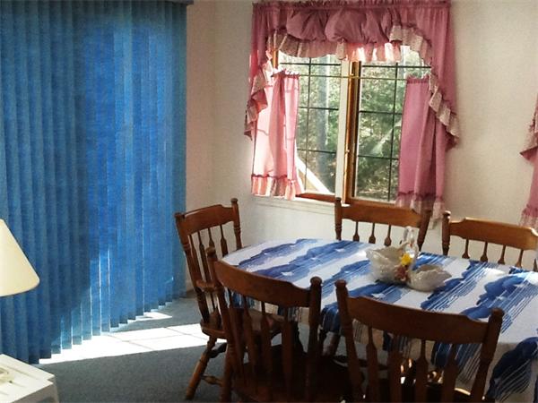 36 Blackbird Road Barnstable, MA 02648 - Photo 12 of 29 a view of a dining room with furniture window and outside view