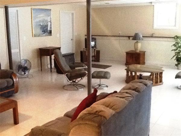 36 Blackbird Road Barnstable, MA 02648 - Photo 14 of 29 a living room with furniture and a air conditioner vent