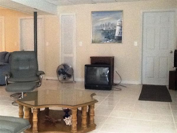 36 Blackbird Road Barnstable, MA 02648 - Photo 17 of 29 a living room with furniture and a fireplace
