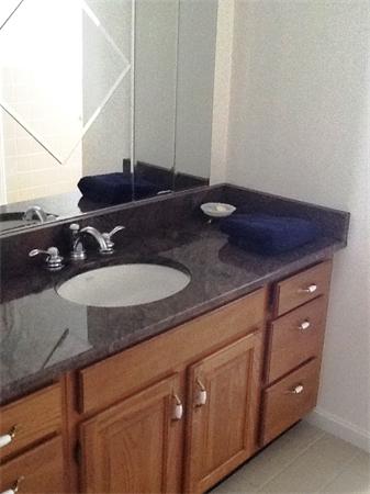 36 Blackbird Road Barnstable, MA 02648 - Photo 18 of 29 a bathroom with a sink and a mirror