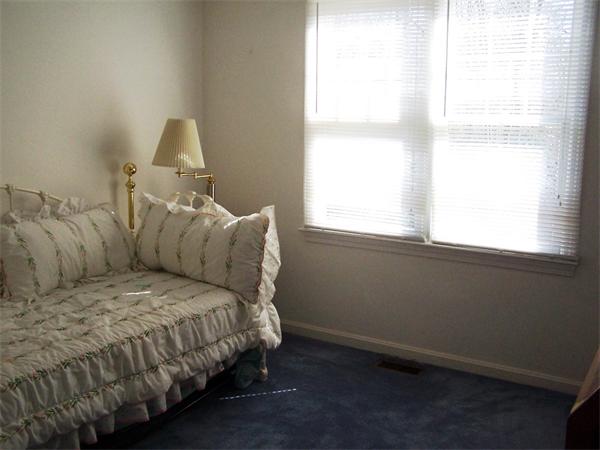 36 Blackbird Road Barnstable, MA 02648 - Photo 21 of 29 a bedroom with a bed and a window