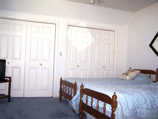 36 Blackbird Road Barnstable, MA 02648 - Photo 23 of 29 a bedroom with furniture and a window