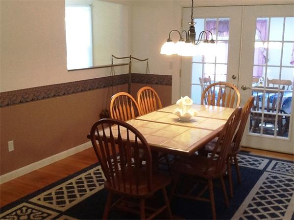 36 Blackbird Road Barnstable, MA 02648 - Photo 6 of 29 a view of a a dining room with furniture window and wooden floor