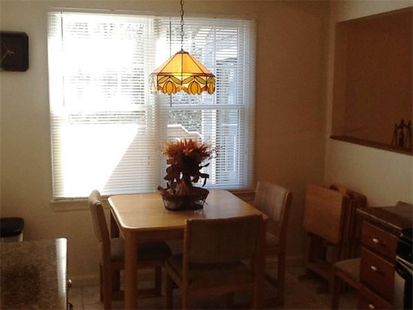 36 Blackbird Road Barnstable, MA 02648 - Photo 10 of 29 a view of a dining room with furniture and window
