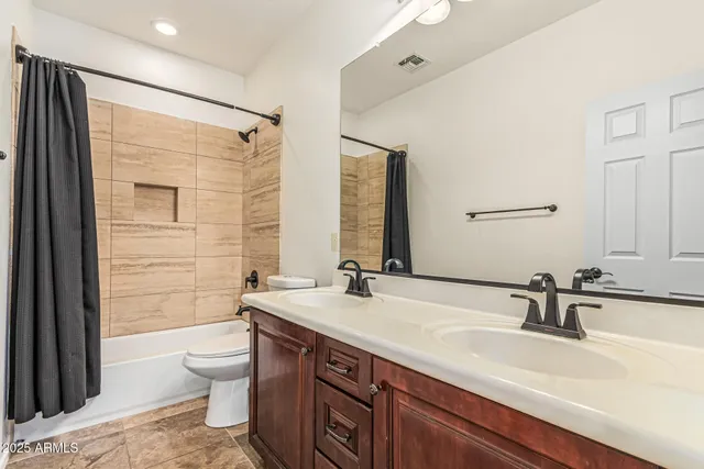 a view of a backyard with sitting area