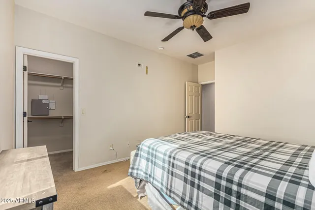 a view of a chairs and table in the balcony
