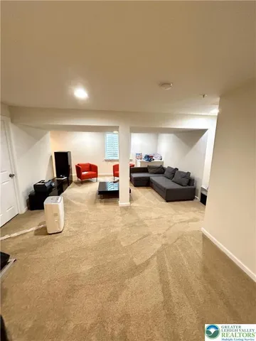 a bedroom with furniture and a bed