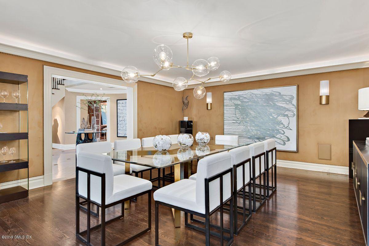 578 Riversville Road Greenwich, CT 06831 - Photo 16 of 38 a view of a dining room with furniture window and wooden floor