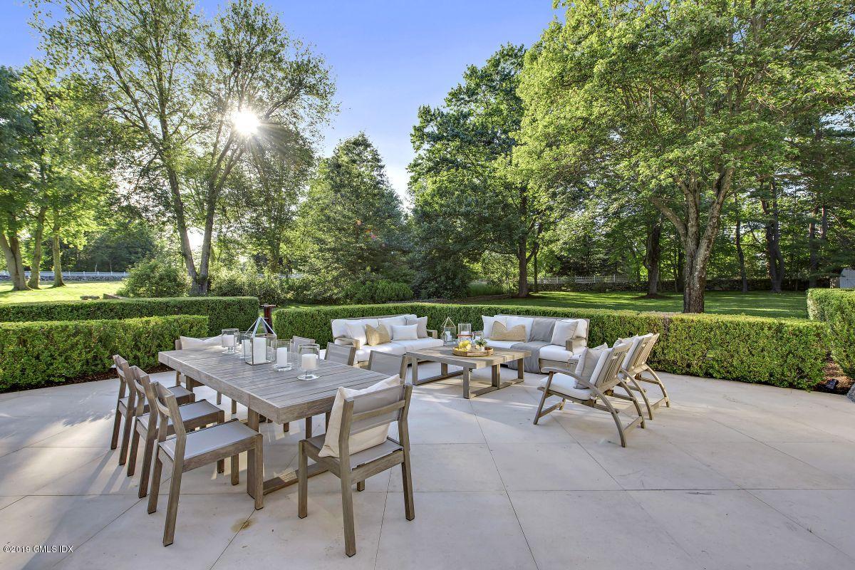 578 Riversville Road Greenwich, CT 06831 - Photo 23 of 38 a view of a patio with a yard