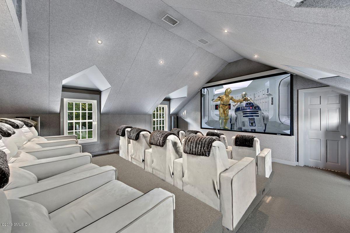 578 Riversville Road Greenwich, CT 06831 - Photo 31 of 38 a living room with furniture and a large window