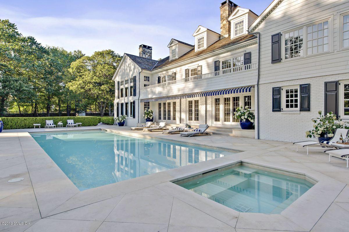 578 Riversville Road Greenwich, CT 06831 - Photo 34 of 38 a view of a house with a swimming pool