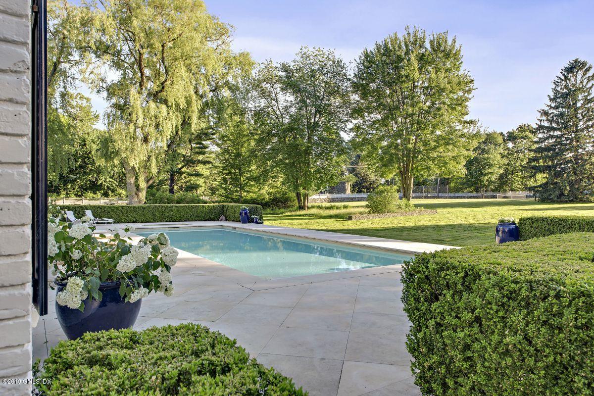 578 Riversville Road Greenwich, CT 06831 - Photo 35 of 38 a view of yard with swimming pool and green space