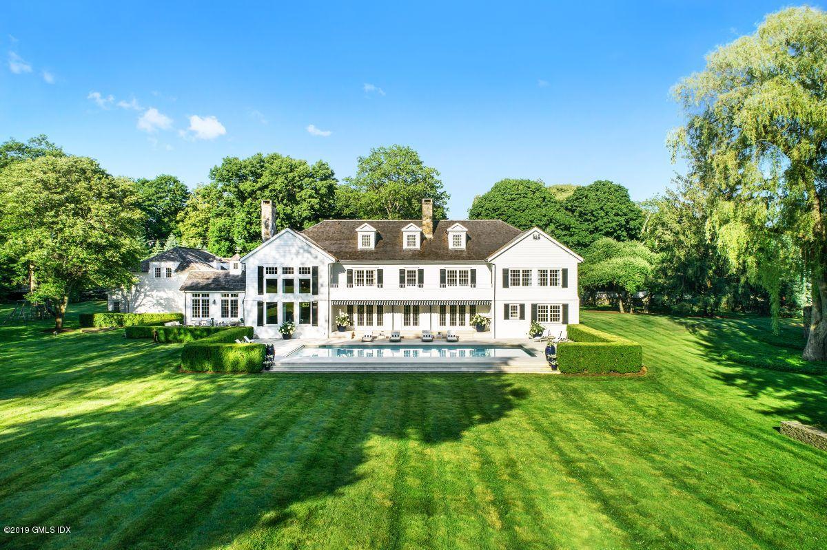578 Riversville Road Greenwich, CT 06831 - Photo 38 of 38 a view of a house with a big yard