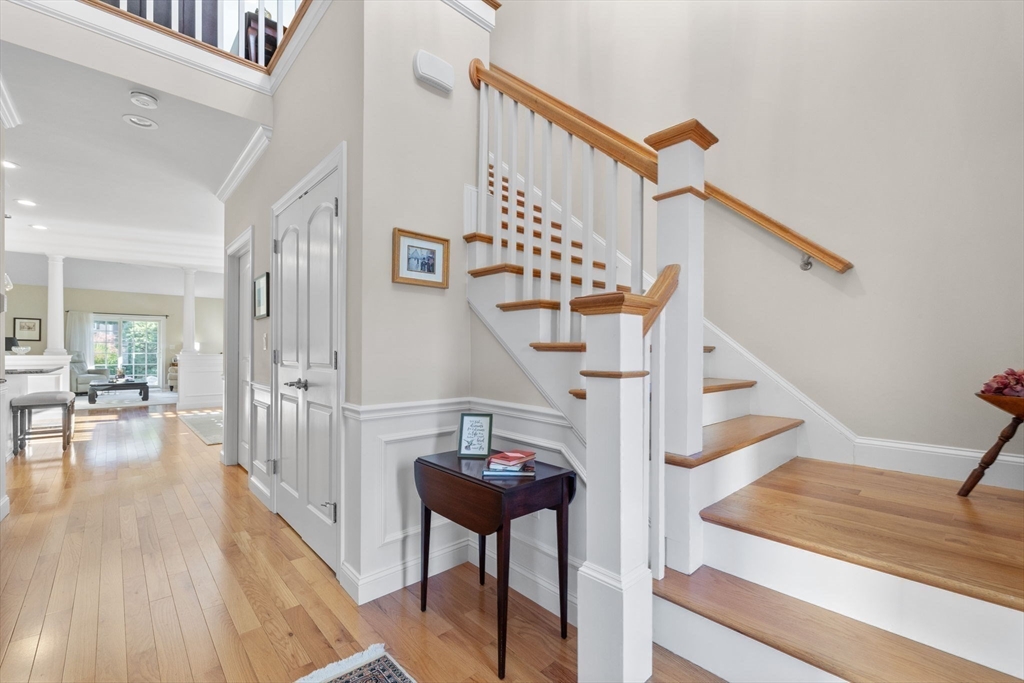 11 Cranberry Lane, Unit 11 Middleton, MA 01949 - Photo 15 of 29 a view of entryway livingroom and hall with wooden floor