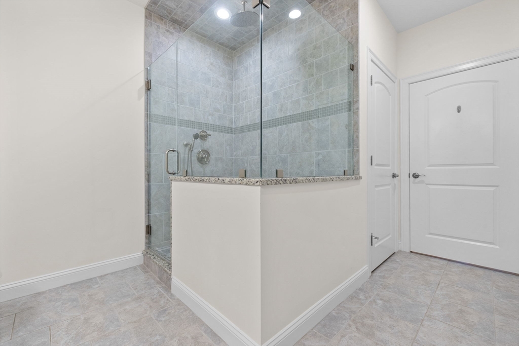 11 Cranberry Lane, Unit 11 Middleton, MA 01949 - Photo 19 of 29 a view of a storage & utility room with closet