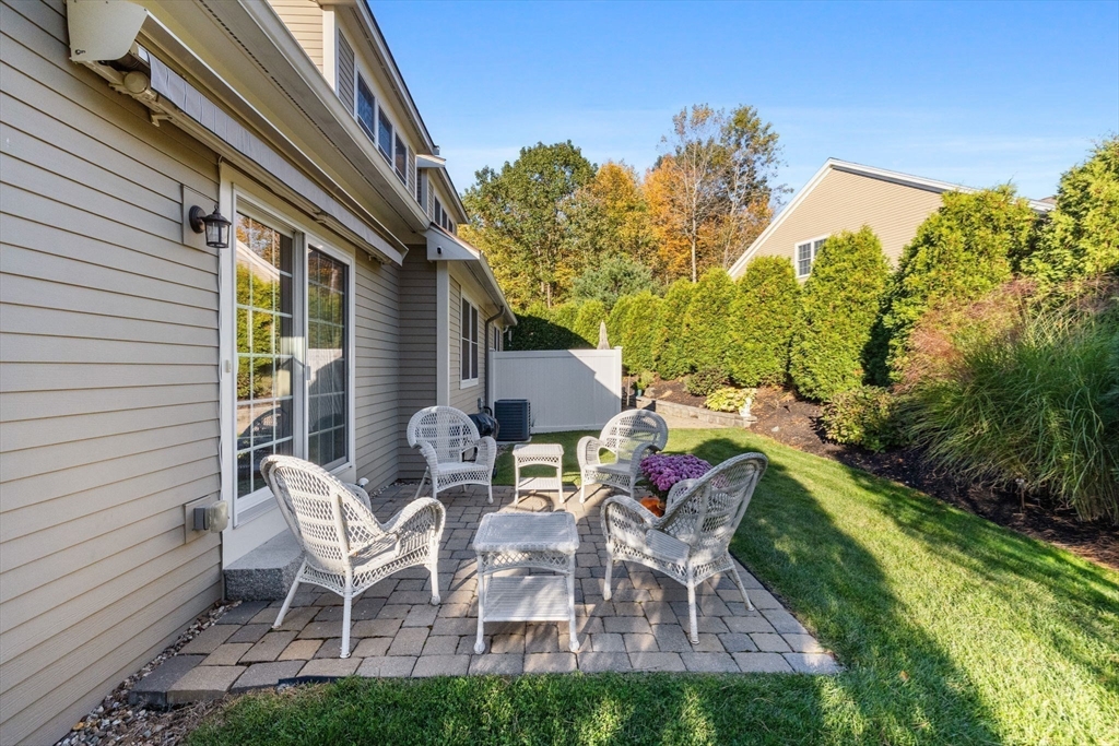 11 Cranberry Lane, Unit 11 Middleton, MA 01949 - Photo 26 of 29 a view of backyard with outdoor seating and green space
