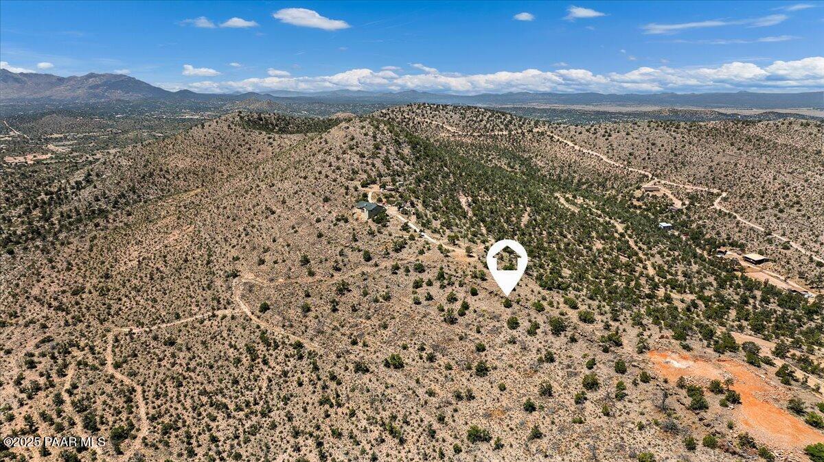 4725 West Hidden Canyon Road Chino Valley, AZ 86323 - Photo 6 of 13 a view of a sky from a yard