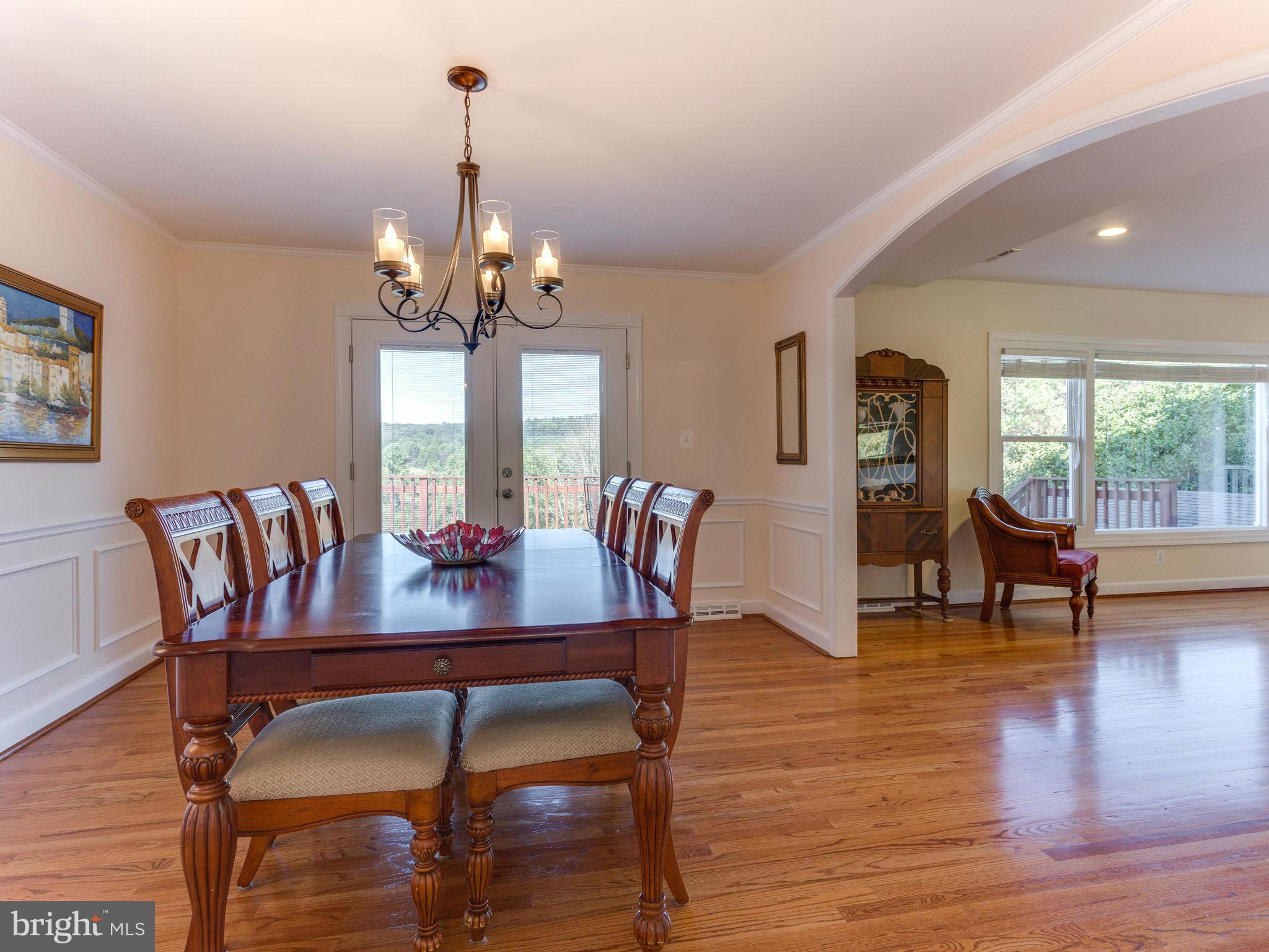 20473 Gleedsville Road Leesburg, VA 20175 - Photo 12 of 30 a view of a dining room with furniture window and wooden floor